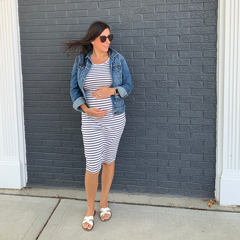 Pregnant mother wearing striped maternity dress